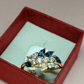 Красивейшее кольцо с синими фианитами и белыми цирконами.Позолота 585 пробы 18К.Размер 17.