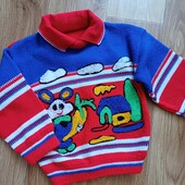 Дитячій яскравий светр.
