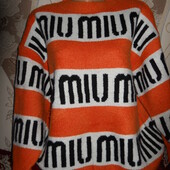 Шикарный теплый модный свитер MiuMiu .