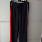 темно сині палаццо на резинці з застібками внизу