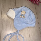 Тепленька шапочка на 9місяців.