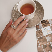 Масивна срібна каблучка з золотими пластинами.