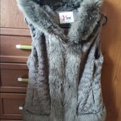 Меховая жилетка
