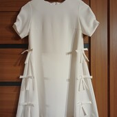 Елегантна сукня молочного кольору