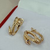 Оригинальные и очень красивые серьги змеи, глазки синие фианиты. Позолота 585 пробы 18К.