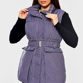 Жіноча стьобана дута жилетка безрукавка на синтепоні.