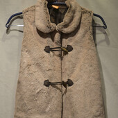 Чудовий плюшевий жилет pusblu