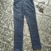 **Стильные брюки в клетку