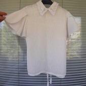 Шикарна нарядна молочна блузка на 7-9 років