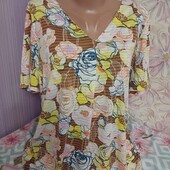 Нова Футболочка .віскоза. обг 108 класснюча Нова.