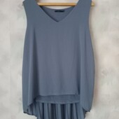 Стильна маєчка- блуза на пишні форми з подовженою спинкою . Розмір наш :50/52
