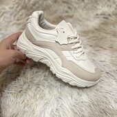 Кросівки. Шкіра