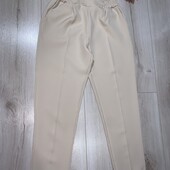 Новий стан.Штанці на резинці з підкатами та кишенями.