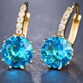 нові сережки