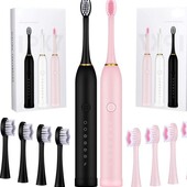 Дві ультразвукові зубні щітки (рожева та чорна) одним лотом