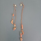 Сережки з півмісяцем та черепом