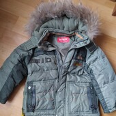 Тепленька пухова куртка