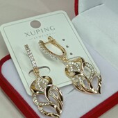 Бесподобные серьги-висюльки с дорожками фианитов. Позолота 585 пробы 18К.