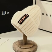 Тепленька м'якенька Шапка кремового кольору