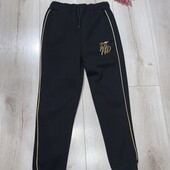 У новому стані.Теплі штанці на зріст 152см.