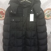 Нова тепла зимова куртка підлітку.