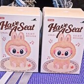 Labubu в виде кролика сидящего. мягкая игрушка-сюрприз V2