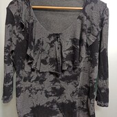 Кофта лёгкой вязки с блестящей ниткой.