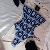 Оригінальний боді з обличчями, з етикеткою