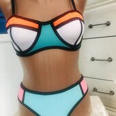 Шикарный купальник из неоплена,размер s.