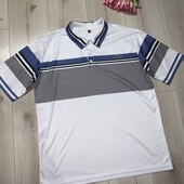 У новому стані.Футболка поло розмір 2ХЛ.