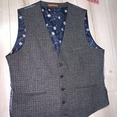 У новому стані жилет розмір Л.